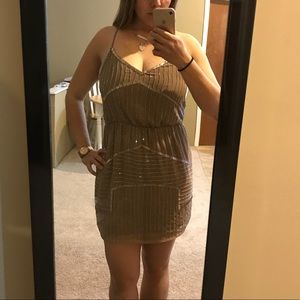 Ravishing beige beaded dress.